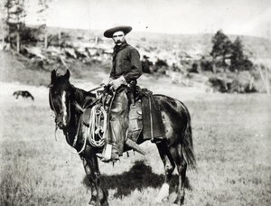 Cowboy lovaglás Montanában, az Egyesült Államokban, kb. 1880